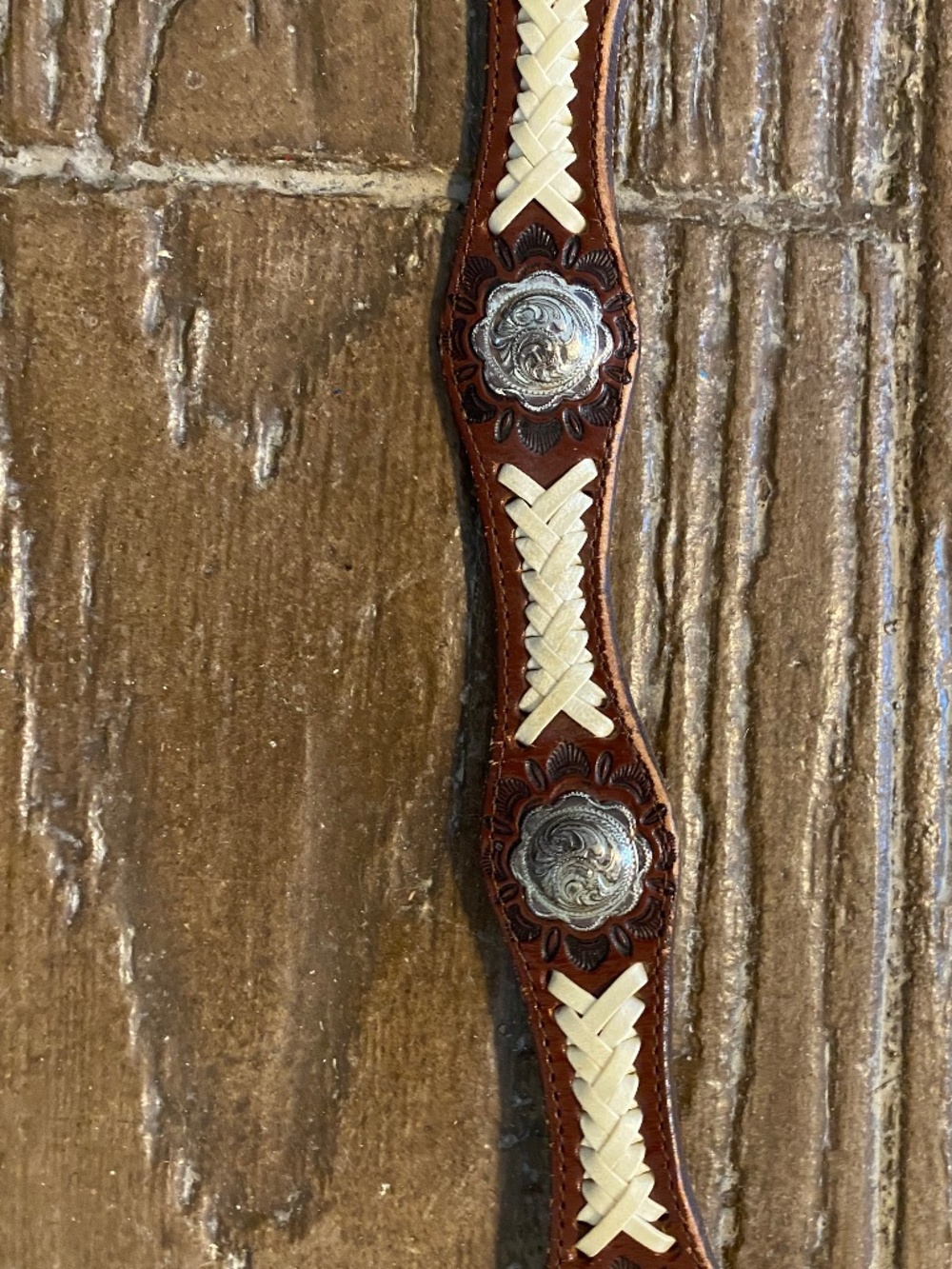 Brown Western leather concho belt. Bought in Jackson Hole, Wyoming years ago